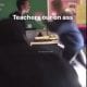 Female teacher fights black teen boy in the classroom