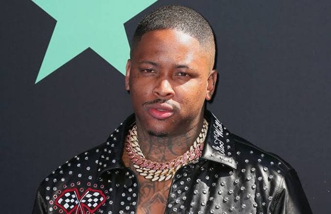 YG kicks fan off stage for refusing to say 'F*ck Donald Trump'