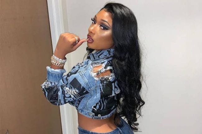 Megan Thee Stallion shows off her new icy grills 