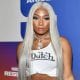 Megan Thee Stallion Reveals She's Single Before Driving Away With YG