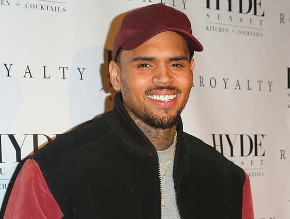 Chris Brown Tattoos Air Jordan Sneaker On His Face 