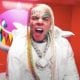 6ix9ine To Drop A Spanish Song This Week, Previews It With A Barely Dressed Model