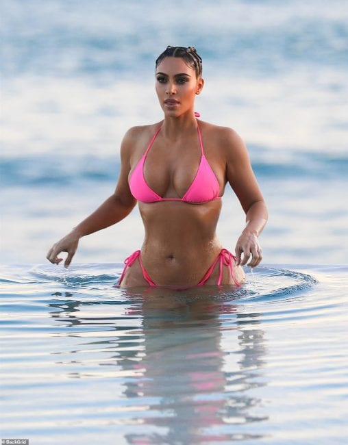 Kim Kardashian's Cat Face At Her Sultry Beach Photoshoot Causes Stir Online