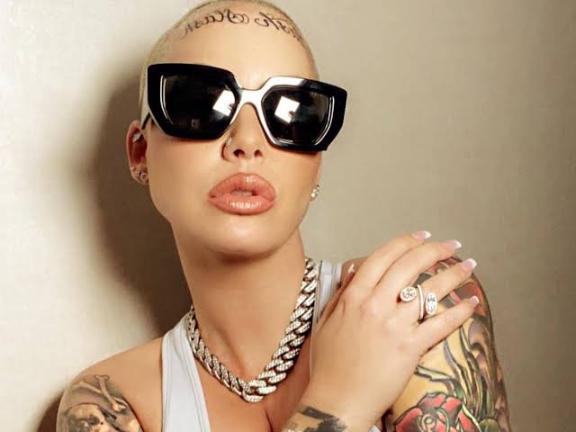 Amber Rose Unveils Dot Tattoos On Her Face - Now Looks Like A Circus Freak
