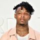 21 Savage Flaunts His New Shining White Teeth, Says He Paid $75K For It