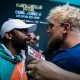 Floyd Mayweather Puts Jake Paul In Headlock After Getting Hat Snatched
