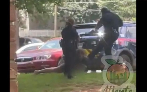 Two Atlanta Police Officers Have Been Suspended After Being Caught On Video Kicking Handcuffed Woman In The Head