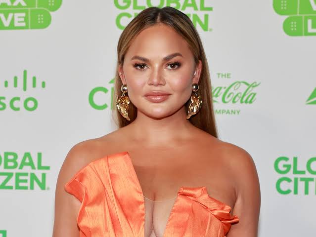 Chrissy Teigen Posts Pics Of Her Personal Chef Spoon Feeding Her While She 'Grieves'