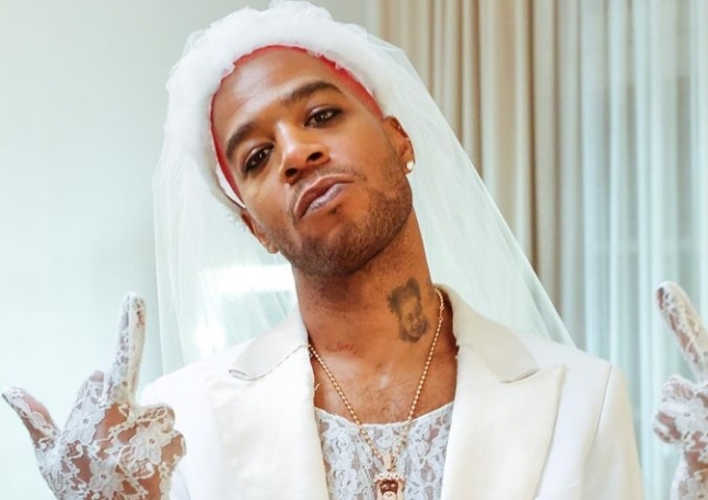 Kid Cudi Steps Out With Supposed Boyfriend Wearing A White Wedding Dress