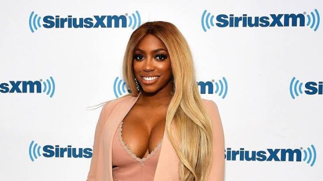 Protester Confronts Porsha Williams For Wearing Fur