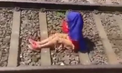 Woman Goes Viral After Train Passes Right Over Her, Then Casually Gets Up And Uses Phone