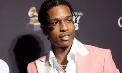 ASAP Rocky Steps On Stage Wearing Rihanna's Clothes - Wig, Skirt & Purse