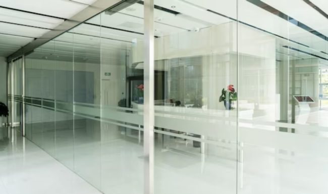 Transparency and Collaboration: The Dual Role of Glass Partition Walls