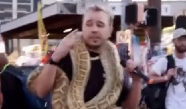 Crypto Rapper Spottie WiFi, Performing Live With A Snake On His Neck In Viral Video 
