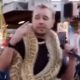 Crypto Rapper Spottie WiFi, Performing Live With A Snake On His Neck In Viral Video