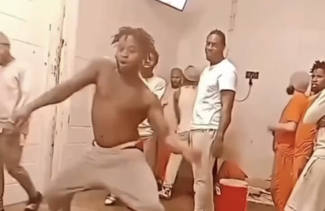 Old Head Jail Inmate Suspiciously Watching Younger Cellmate Show Off His Dance Moves 